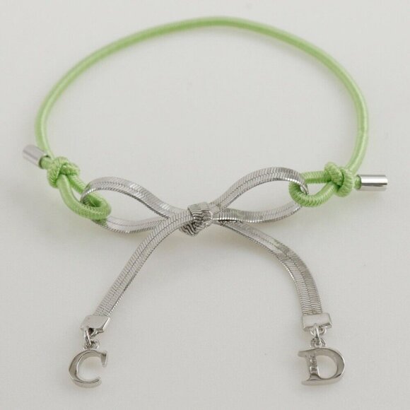 Dior | Jewelry | Dior Cd Ribbon Bracelet Silveryellow Green ...